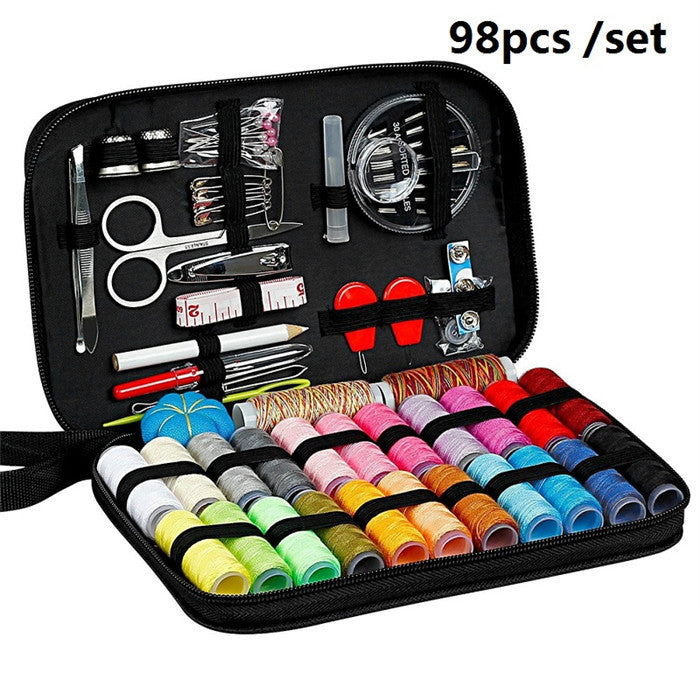 Sewing kit with various tools and colorful thread spools in a black case.