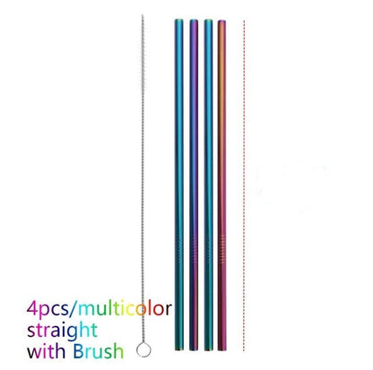 Set of four multicolored straws with a brush on a white background